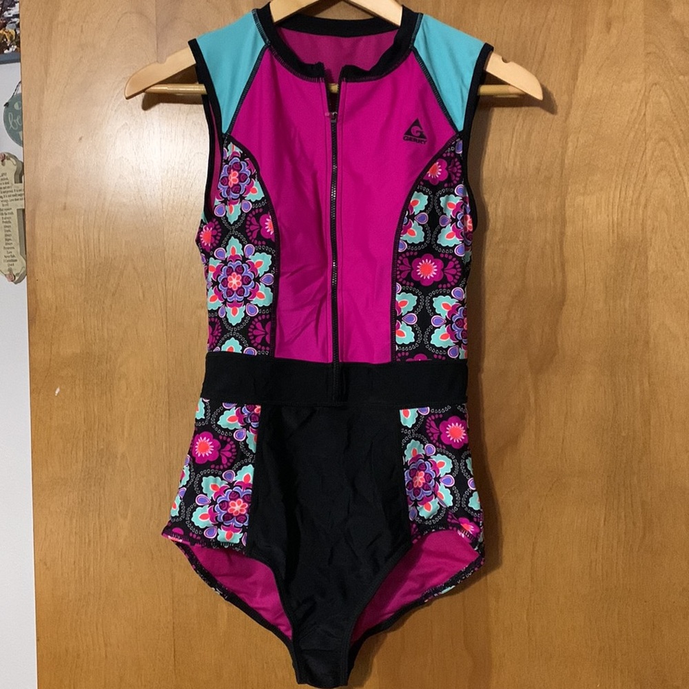 M Body swimsuit. Bright beautiful colors. Zip up front.
